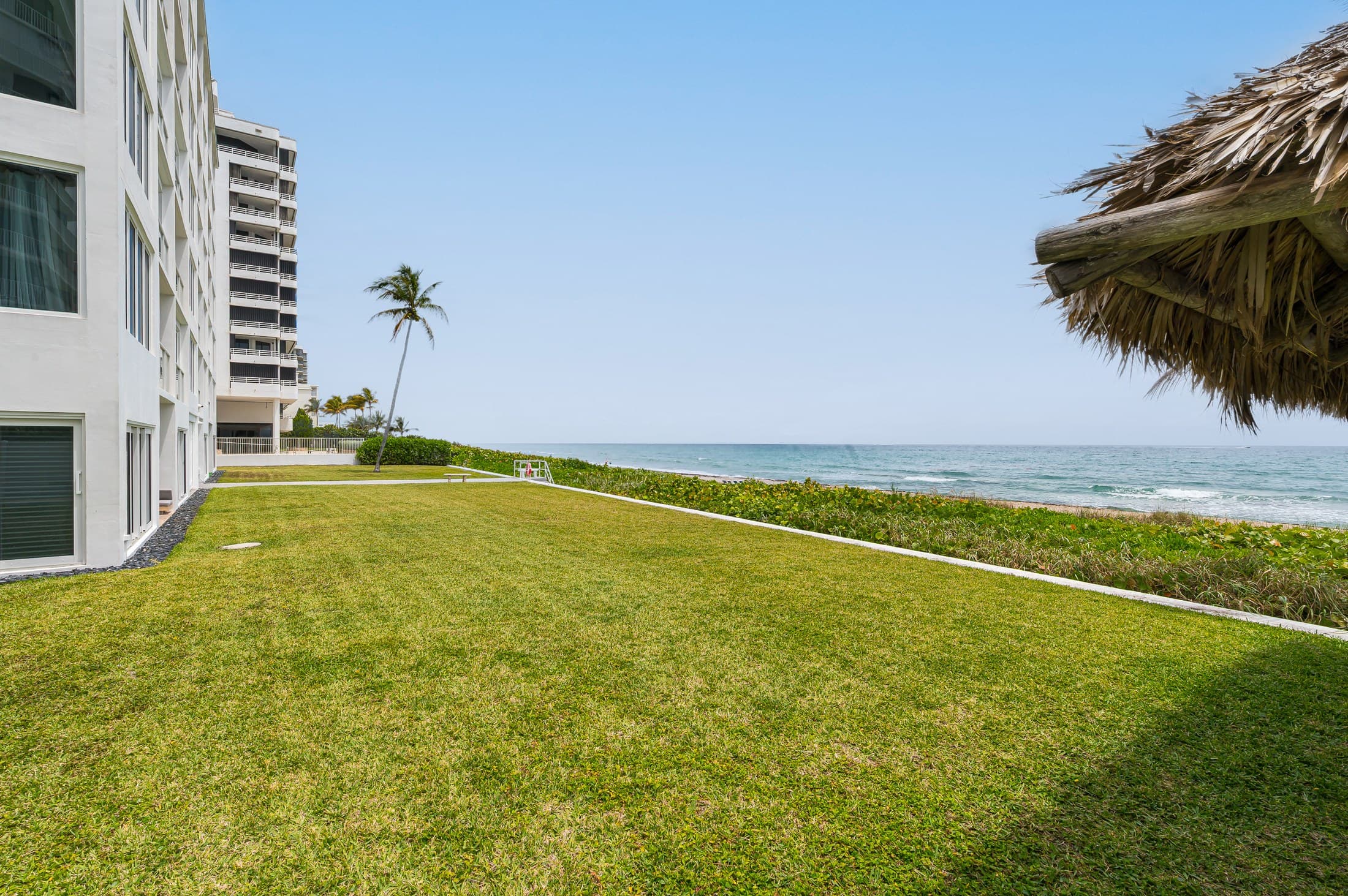 Highland grounds with lawn and coastal setting